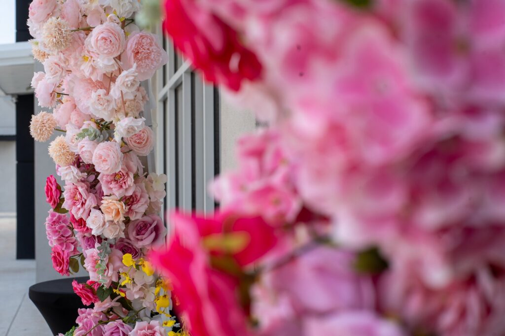 Close-up of pink and white wedding florals at a Katy TX wedding venue